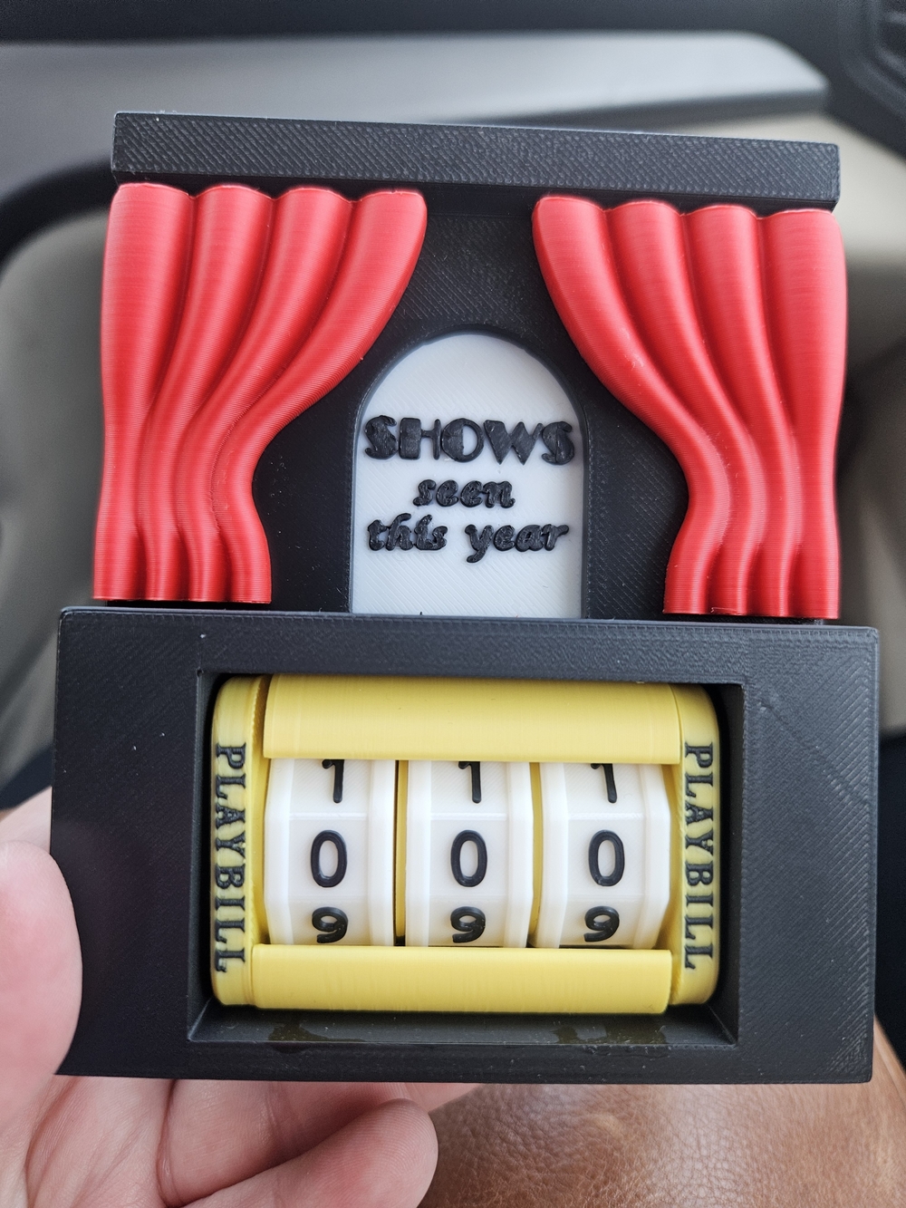 Theater Playbill Counter with Red Curtains
